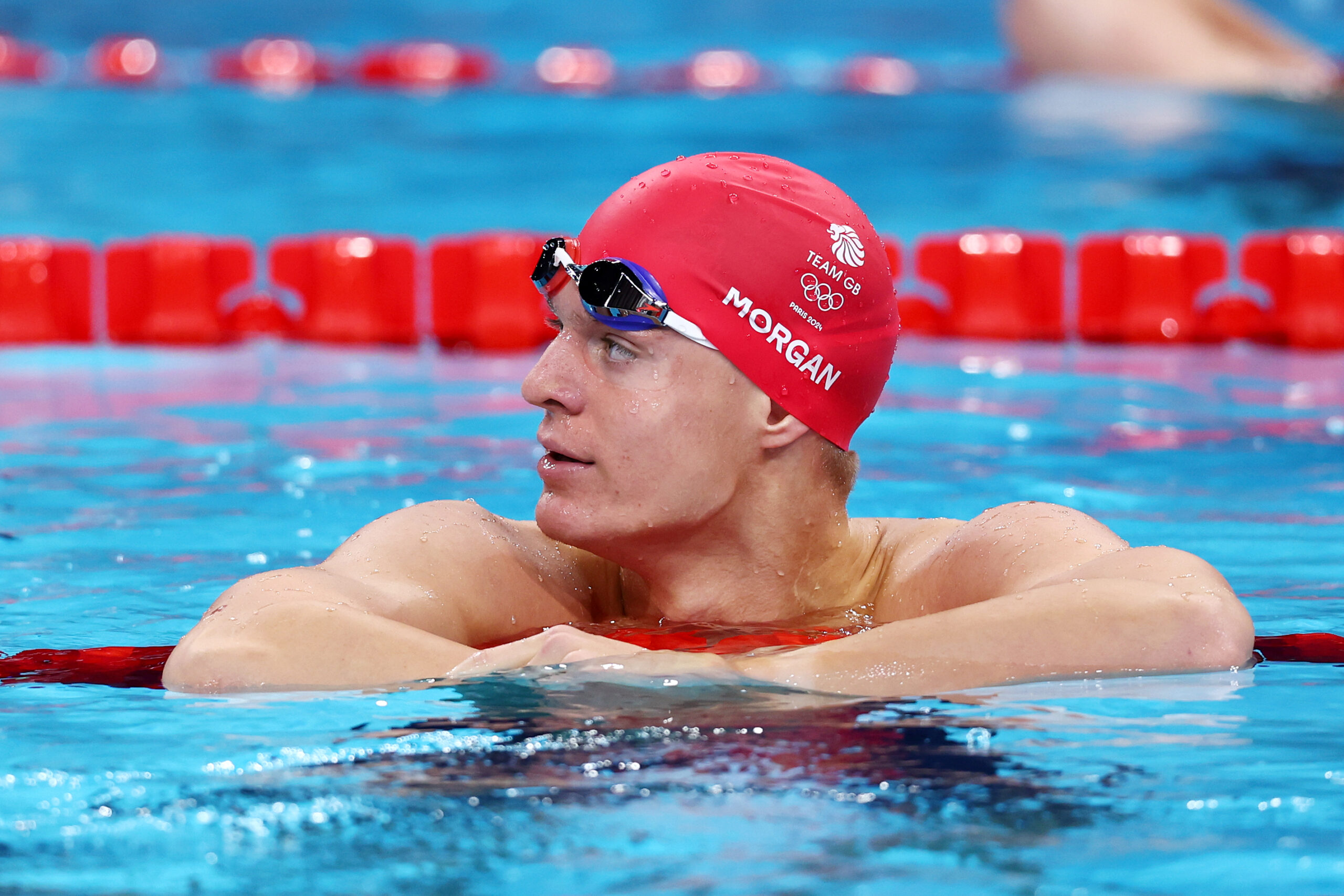 Ollie Morgan in pool wearing swim cap
