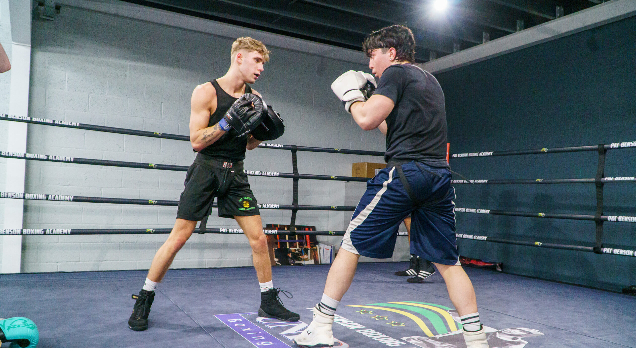 Two males in the boxing ring