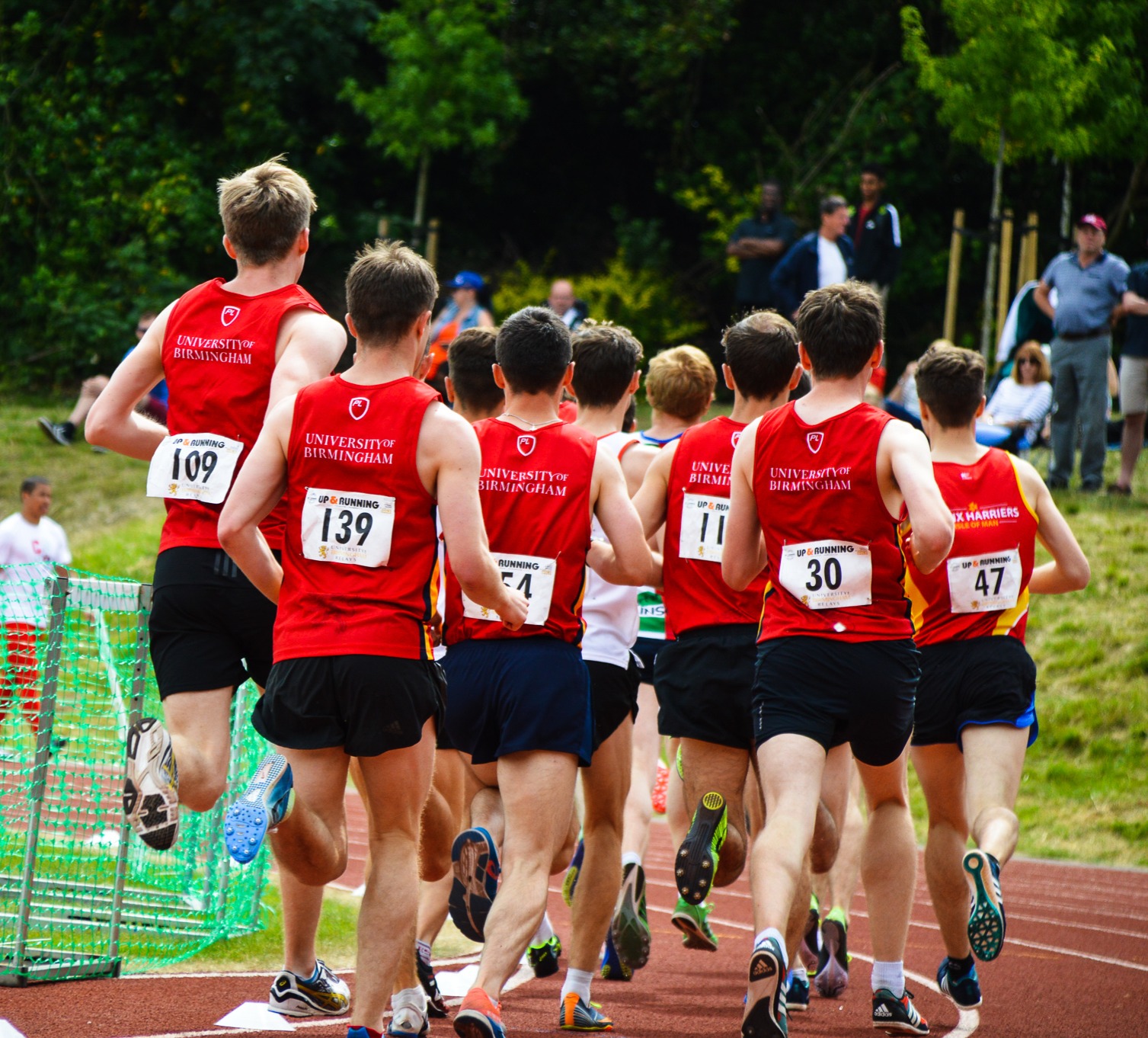 group of UoB runners taking part in a track race