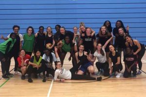 Group of females in a team photo after social basketball