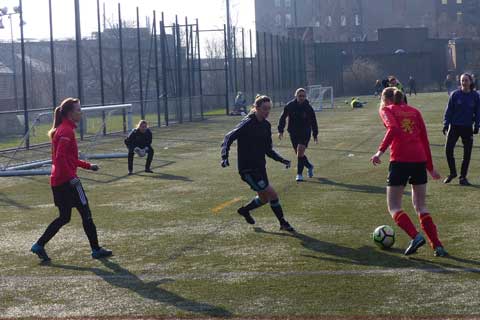group of females playing football