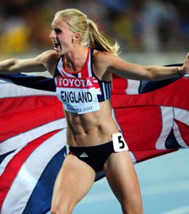 Hannah England celebrating with a GB flag