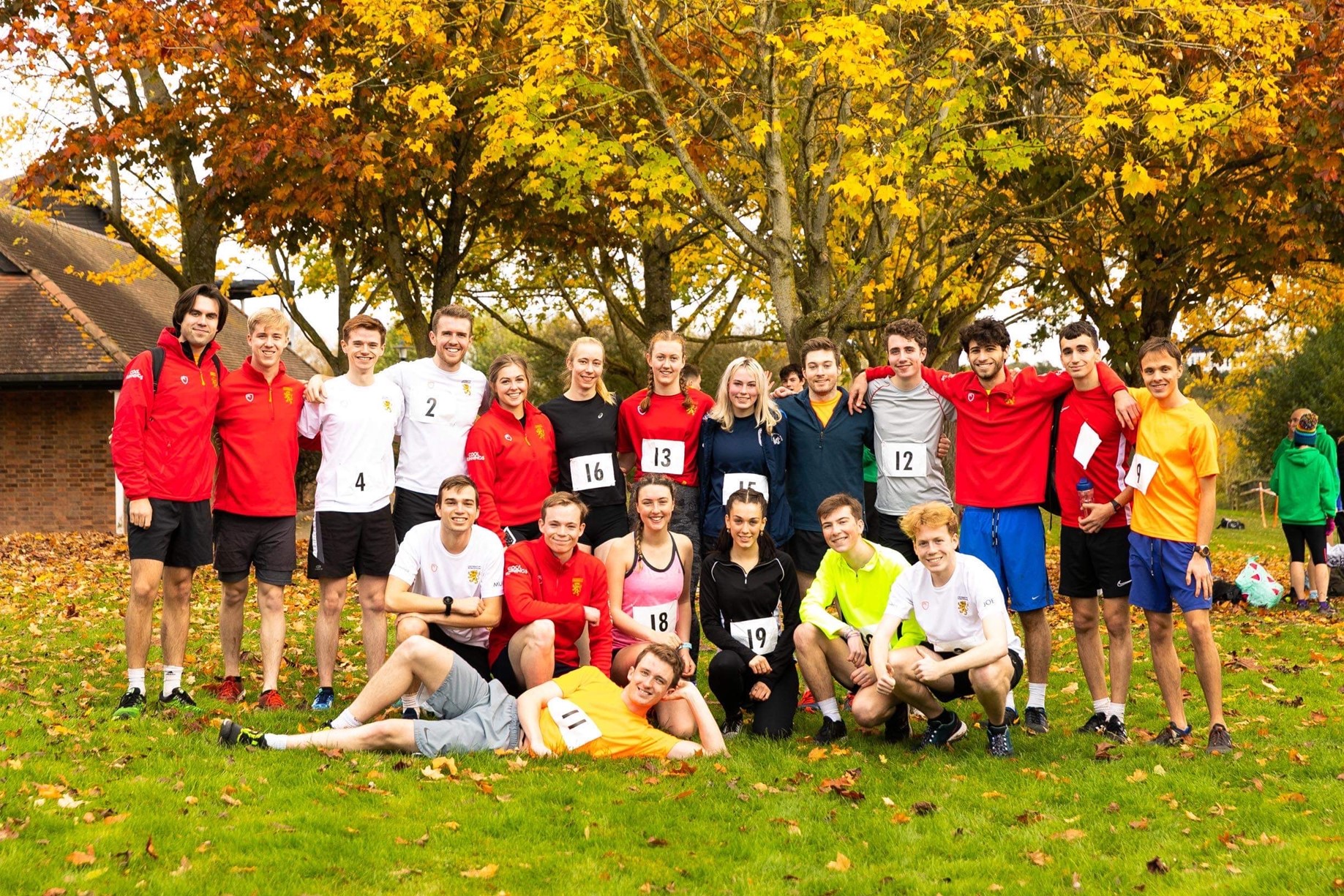 Group of runners posing for a photo