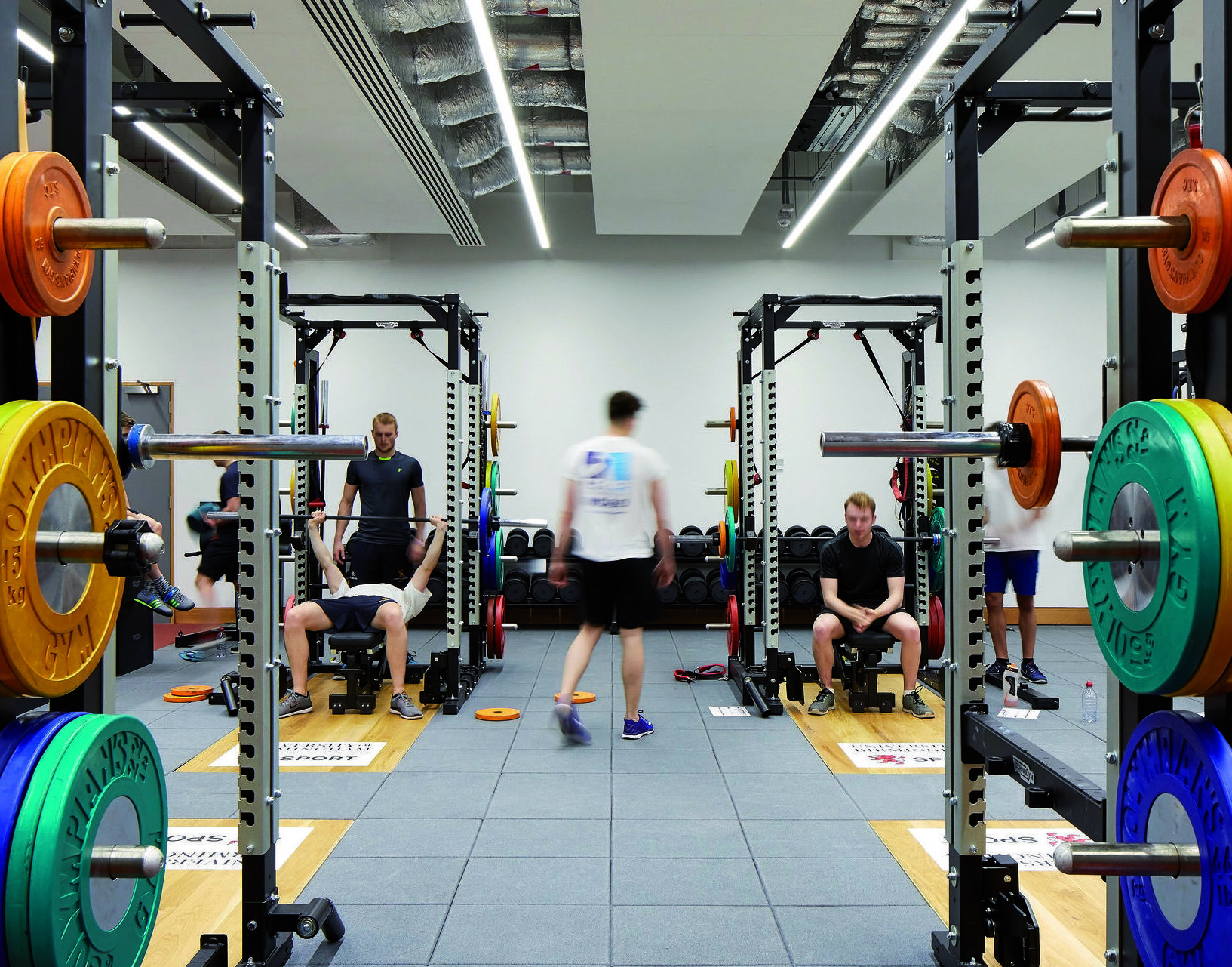 Student using the gym equipment in Tiverton Gym.