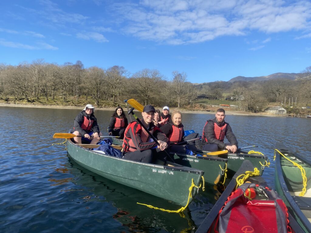 A group of students on a boat on Lake Coniston
