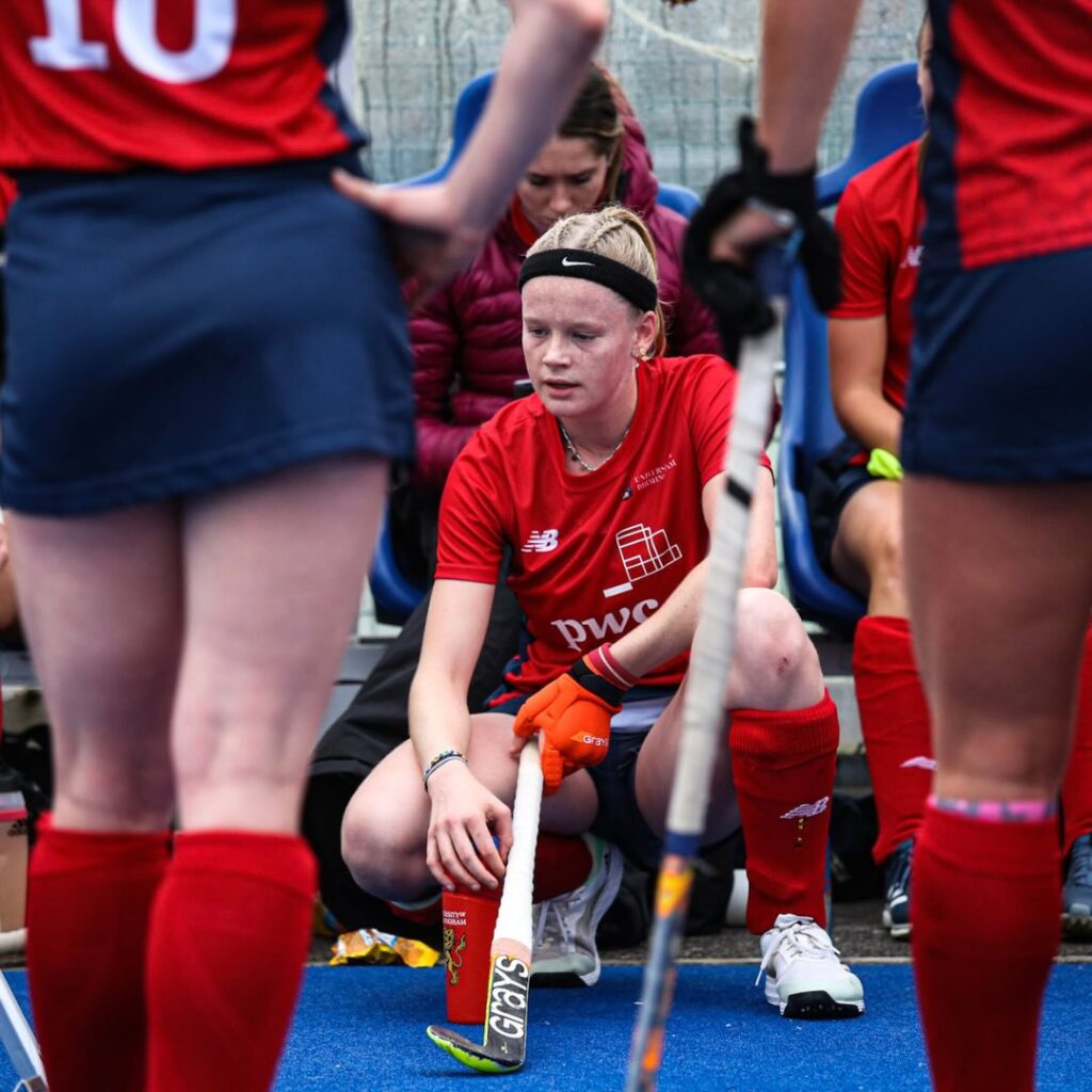 Emma sat with Hockey team