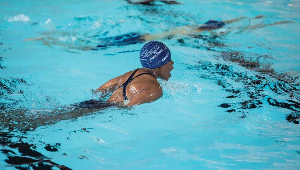 Member swimming in UoB Sport & Fitness pool