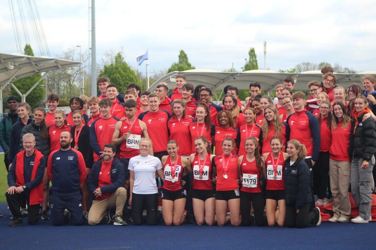 Team photo of the whole UoB Athletics team smiling at BUCS Outdoors 2023