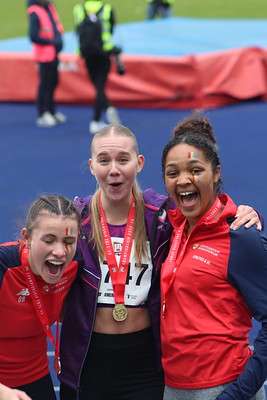 Female athletes smile with medals round their necks at BUCS Outdoors 2023