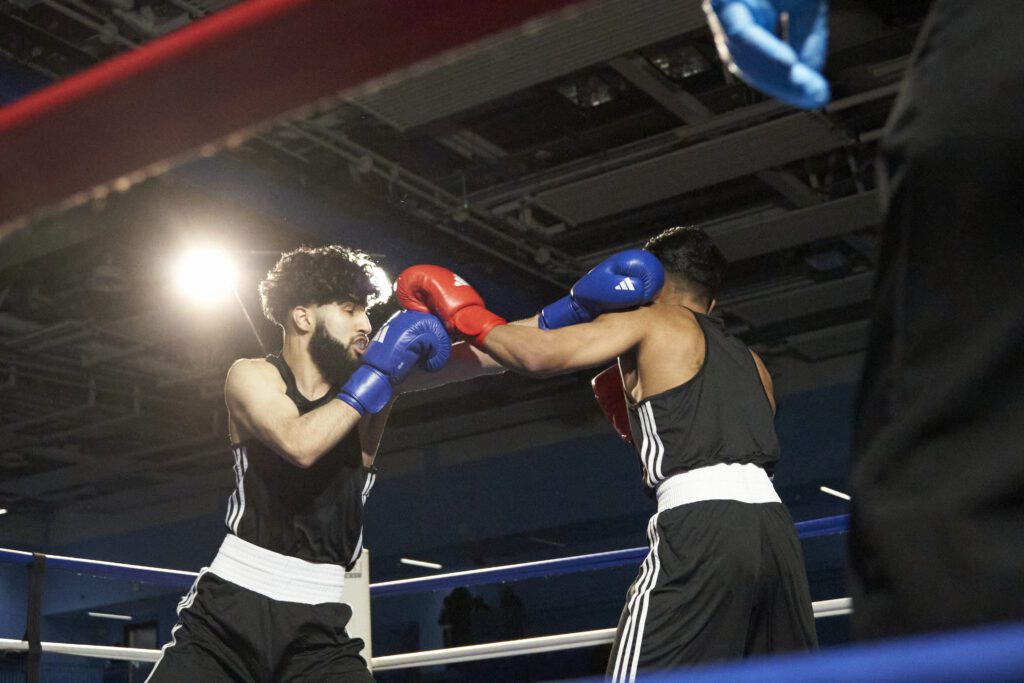 Boxing showcase, boxer punching other boxer
