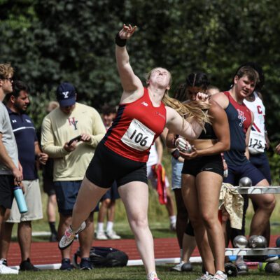 UoB female athlete throwing shotput