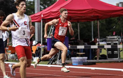 Picture of UOB athlete running alongside Ivy League competitor