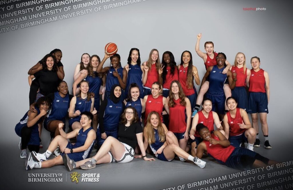 Womens basketball club grouped together for a funny professional photograph