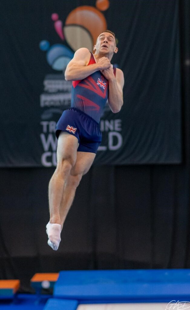 Andrew Stamp mid-air, representing team GB at the Trampolining World Championships.