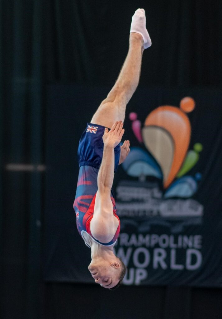 Andrew Stamp mid-air, representing team GB at the Trampolining World Championships.