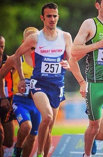 Image of young Dean running on a track for GB