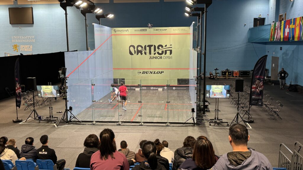 Spectator view of glass courts in Munrow Arena