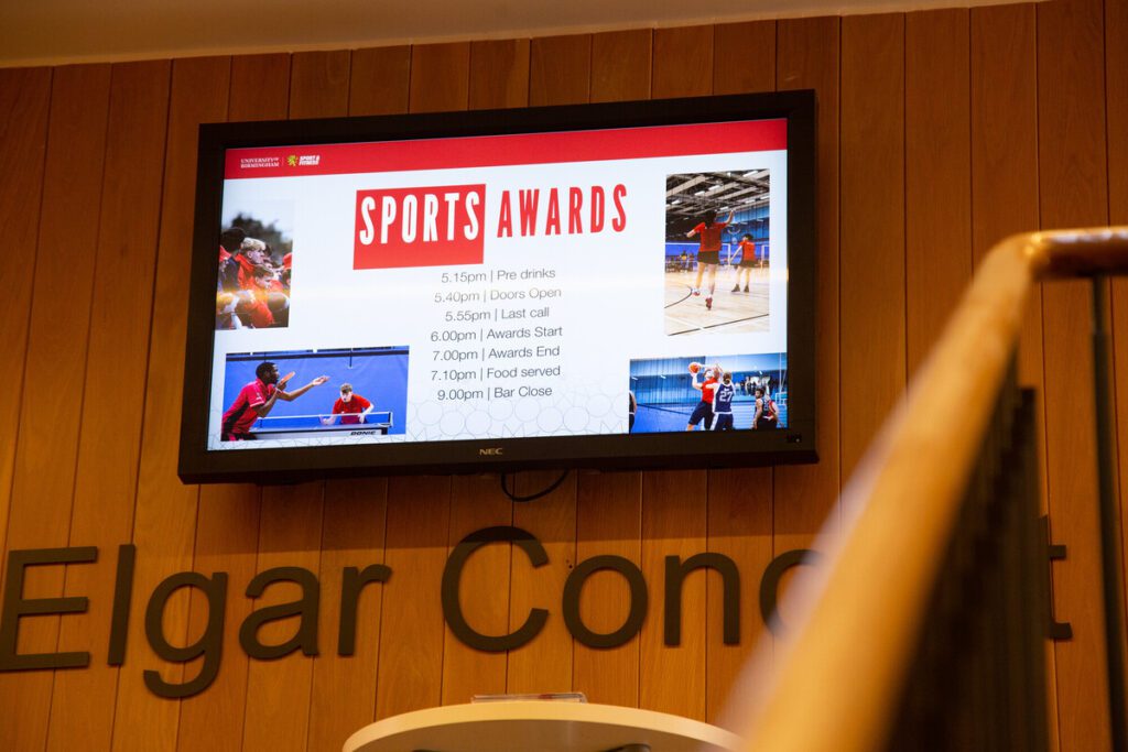Sports Awards timings on a screen in the Elgar Concert area.