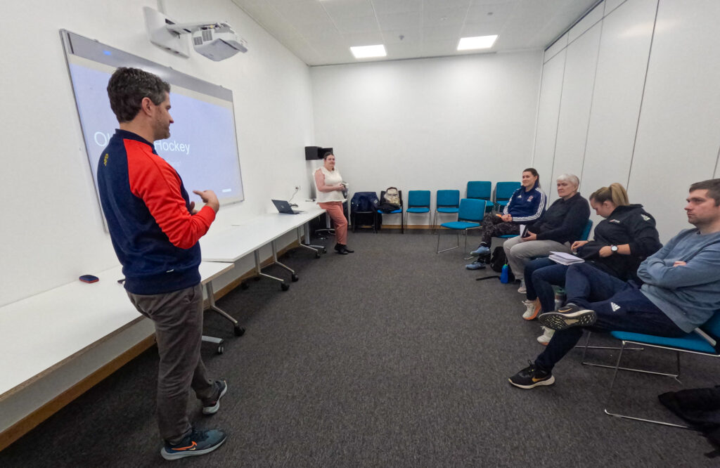 Luke Gunn, Head of Perfomance delivering presentation to umpires