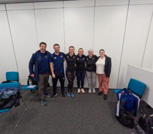 Umpires and the University of Birmingham Performance Team group photo.