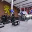 Gym area at Sport & Fitness with cardiovascular machines and weight machines.