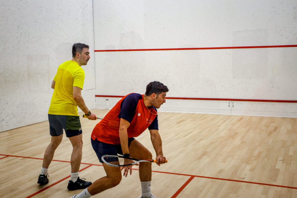 Men's Squash players in court