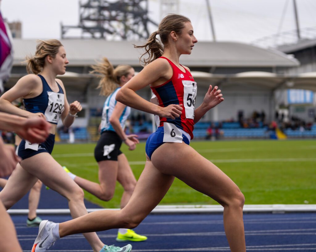 Abbie Ives running side shot