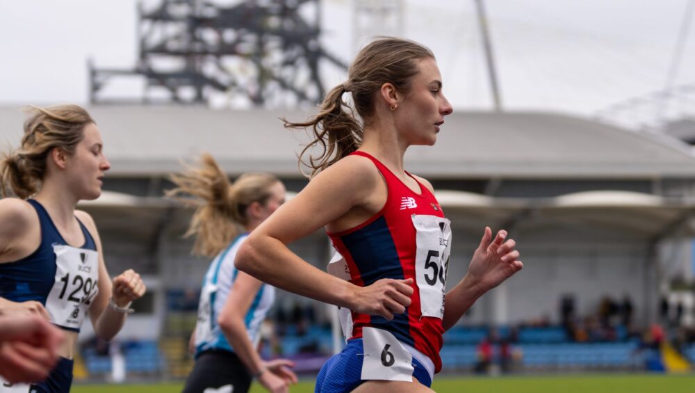 Abbie Ives running side shot
