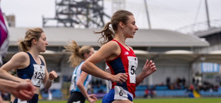 Abbie Ives running side shot