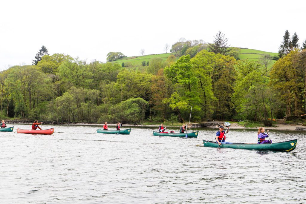 Students canoeing on Lake Coniston.