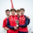 Athletics students holding trophy