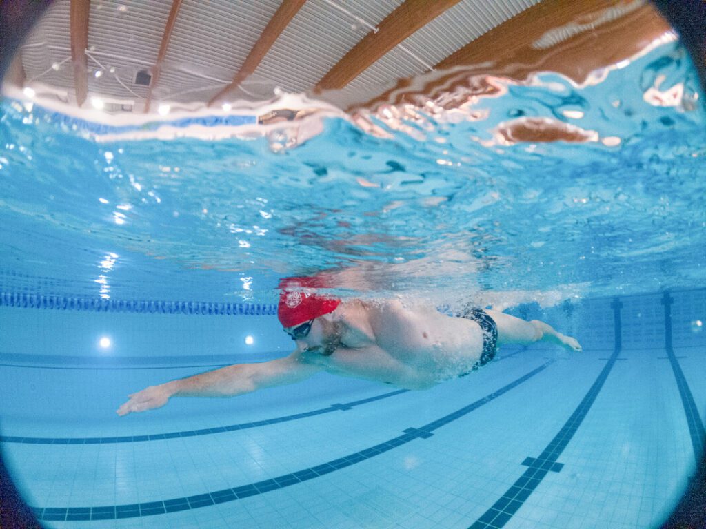 Member swimming in the pool.