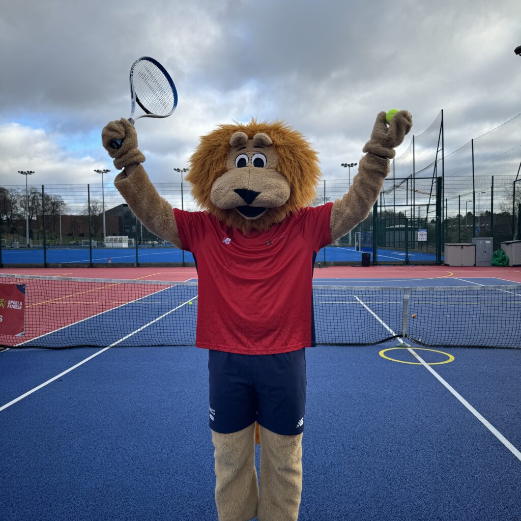 Rory with a tennis racket