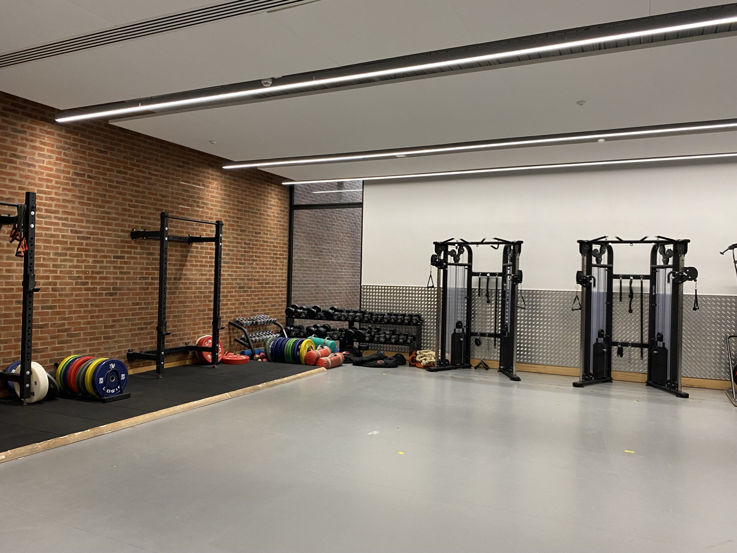 Cable machines and open workout space in Studio 2 space at Uni of Birmingham sport and Fitness Gym.