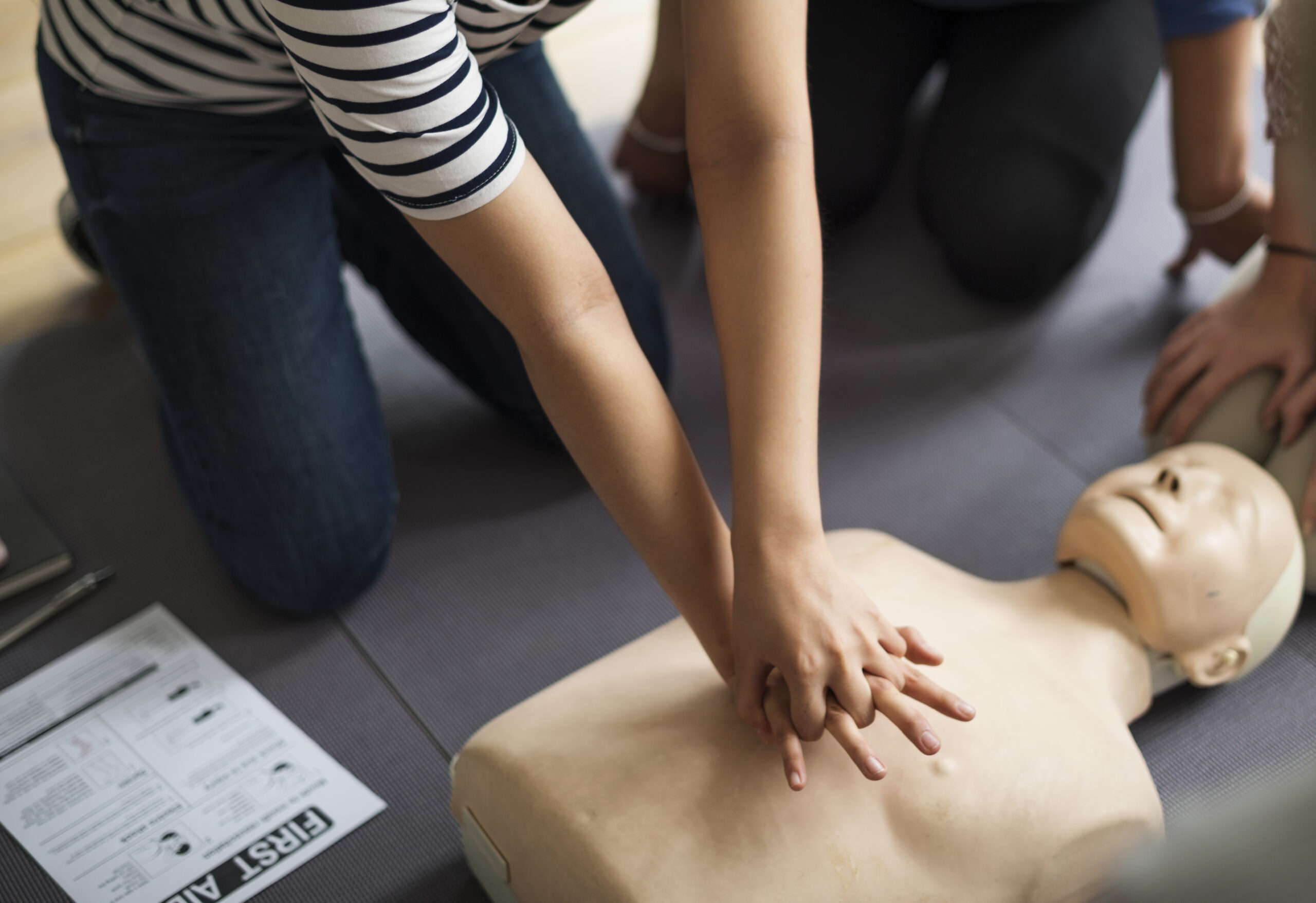 Person learning CPR