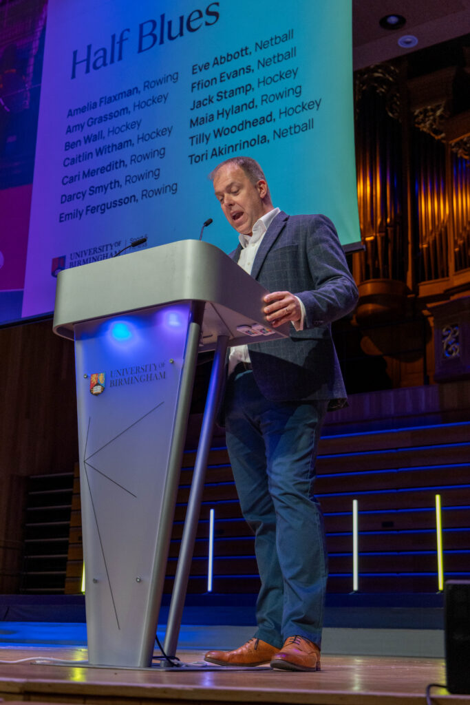 Ian Pollock presenting the Half Blues.