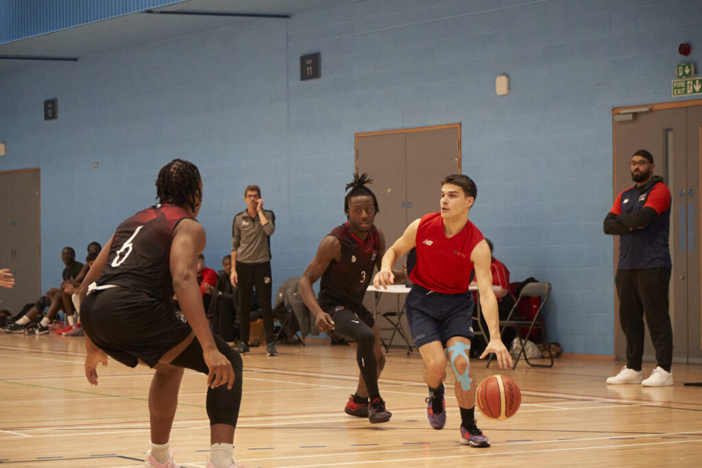 Men playing basketball.