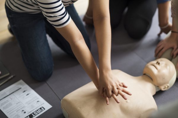 Person learning CPR